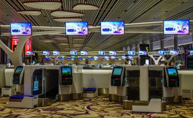 Singapur - Mar 28, 2019. Changi Havaalanı Terminal 4'teki Self Servis Check-in Kioskları (Sin). Terminal 4 resmen Ekim 2017'de açıldı.