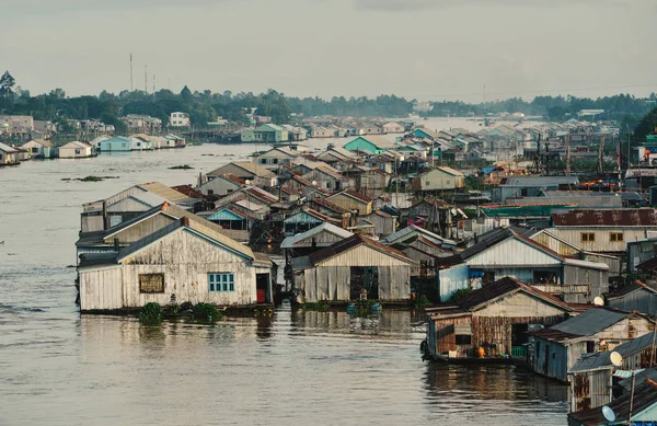 Floating houses on Mekong River in Chau Doc, Vietnam. Chau Doc is a city in the heart of the Mekong Delta, in Vietnam.