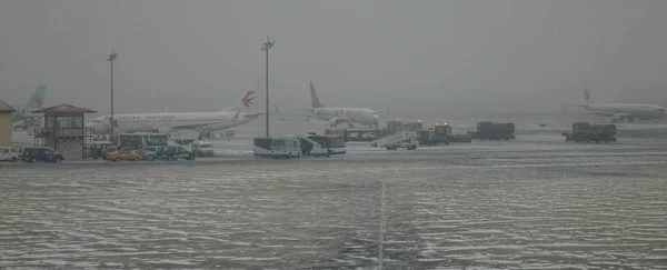 Civil airport in a snowing winter day — Stock Image Civil airport in a snowing winter day Stock Picture