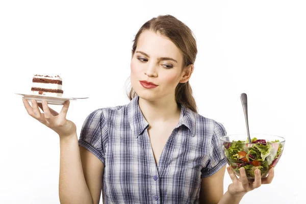 Cake Salad Young Girl Making Difficult Choice White Background — Stock Photo, Image