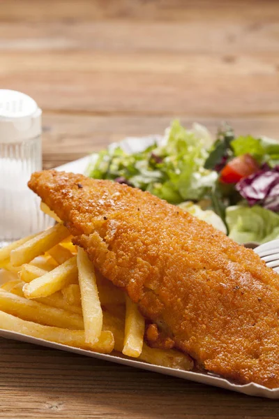 Fried fish and chips on a paper tray — Stock Photo, Image