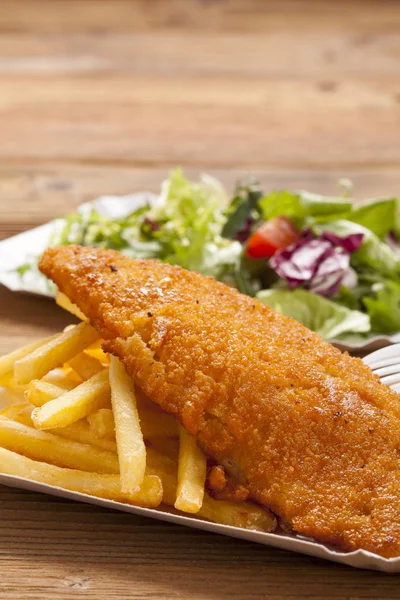 Fried fish and chips on a paper tray — Stock Photo, Image