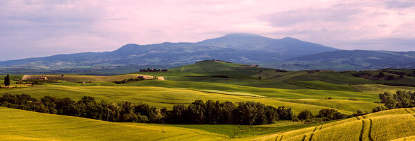 Beautiful and miraculous colors of green spring panorama landscape of Tuscany, Italy.