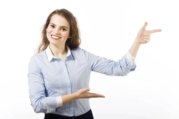 Portrait of a beautiful smiling young woman dressed in a blue sh — Stock Photo, Image