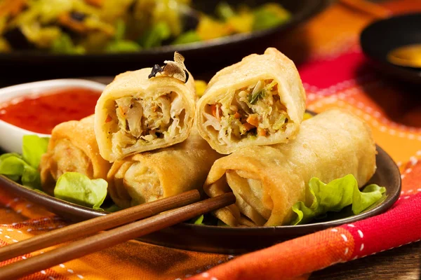 Portion baked spring rolls with vegetables and rice on a plate. — Stock Photo, Image