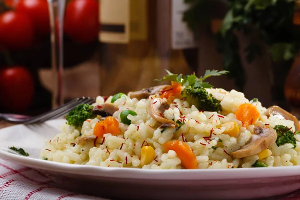 Classic Risotto with mushrooms and vegetables served on a white — Stock Photo, Image