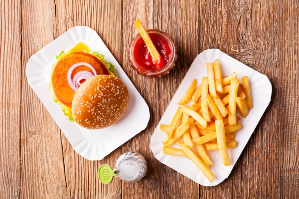 Delicious fish burgerserved with fresh french fries, servwed on — Stock Photo, Image