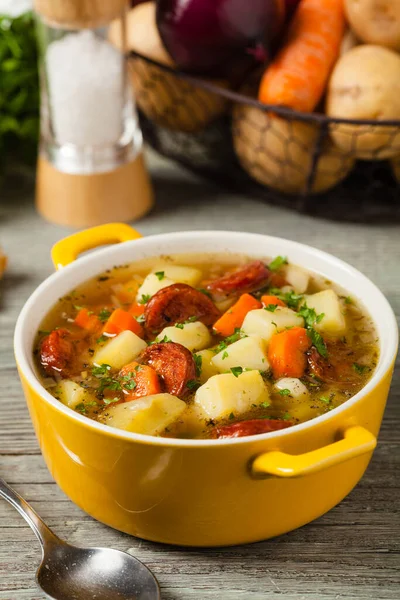 Traditional potato soup. Front view.