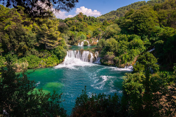 Waterfalls and green watercolor lake Krka National Park, Dalmatia, Croatia near Sibenik