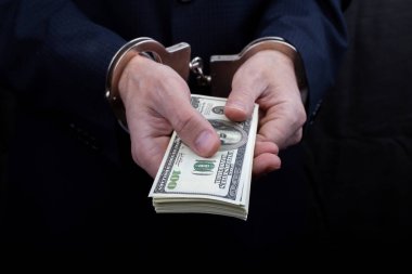 Rüşvet, closeup tutan kelepçeleri işadamı