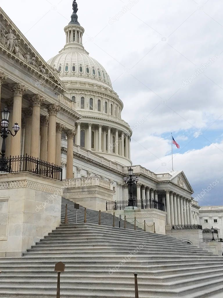 The Eastern facade of the United States Capitol Building, with the House of the Representative's stair, on Capitol Hill in Washington DC, USA.