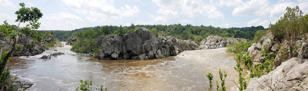 A Potomac river panorama with the waters swollen by heavy rains, at the Great Falls, USA