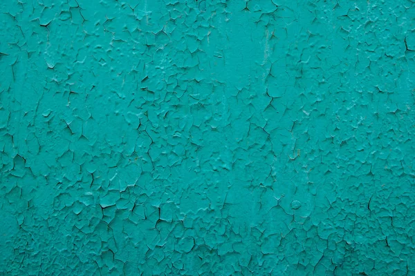 Gammal grön rostiga järn bakgrund med resterna av bitar av rester av gamla måla. Strukturen på en rostig järn yta, peeling färg — Stockfoto