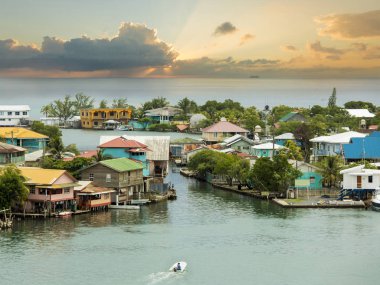 Oak Ridge area of Roatan Island, Honduras at sunrise. Oak Ridge is known as the Venice of the Caribbean. clipart