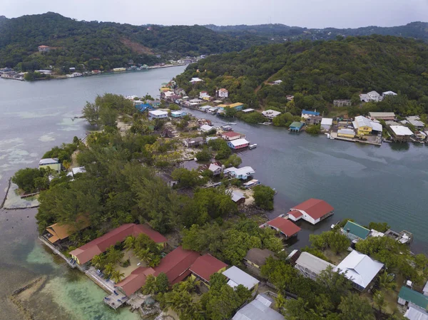Aerial view of houses on stilts in the Oak Ridge area of Roatan, Honduras. — Stock Image Aerial View Houses Stilts Oak Ridge Area Roatan Honduras Stock Photo