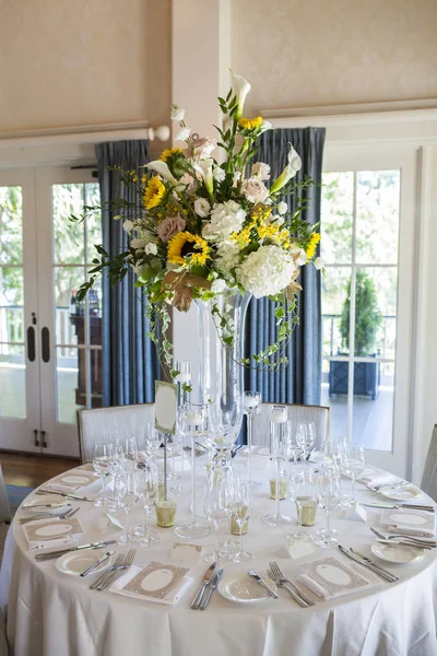 Elegant table arrangement for wedding reception