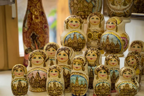 Russian nesting dolls standing in a row