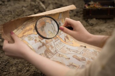 archaeologist excavates and searches for treasure clipart