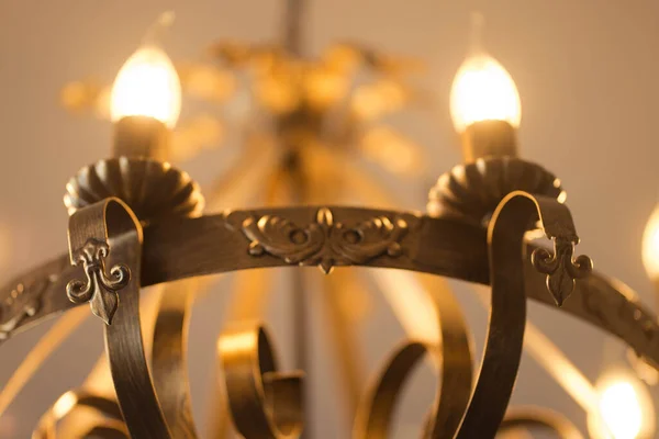 Metal large chandelier with bulbs — Stock Photo, Image