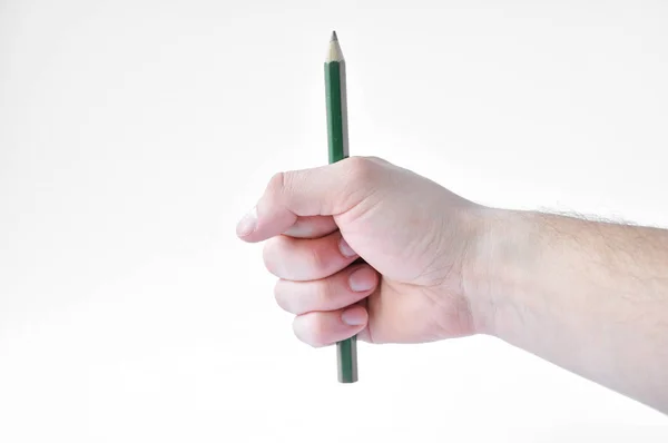 Mão Apertada Punho Lápis Verde Punho Sobre Fundo Branco — Fotografia de Stock