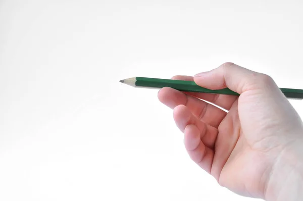 Grüner Bleistift Der Hand Auf Weißem Hintergrund — Stockfoto