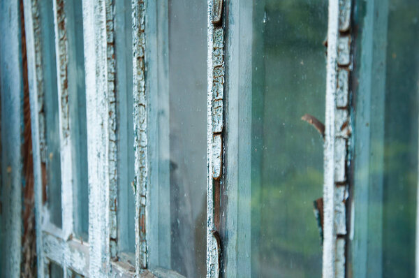 Old large window with glass inserts.