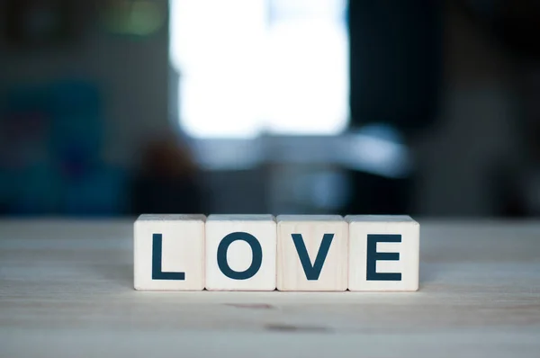 Das Wort Liebe Auf Einem Holzwürfel Briefkonstrukteur — Stockfoto