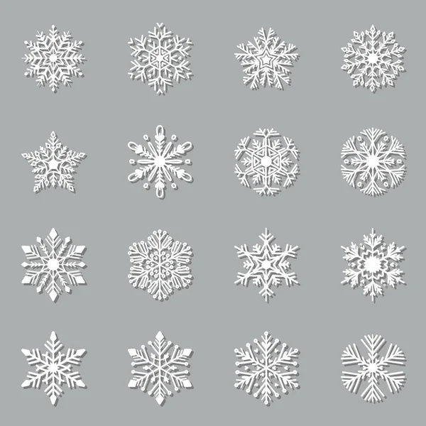 Weihnachtspapier geschnitten Schneeflocken-Set. Vektorsymbole — Stockvektor