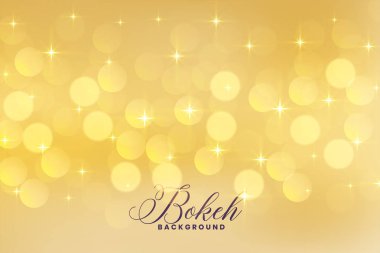 Yıldızlı, altın renkli güzel bokeh ışıkları.