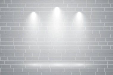 Üç odak ışığı üzerine düşen gri duvar
