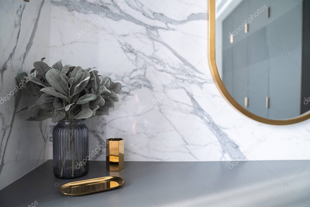 Bedroom working corner decorated with hexagon gold stainless vase