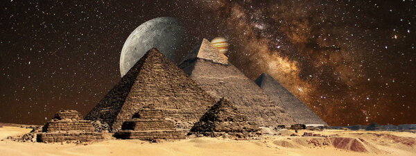 Egyptian pyramids with galaxy and planets on background 