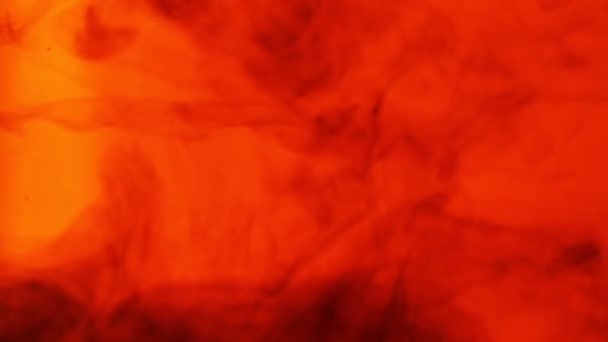 Σύννεφα Μελανιού Κινούνται Μέσα Από Νερό Πορτοκαλί Φόντο Και Κόκκινο — Αρχείο Βίντεο