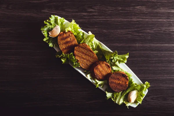 Cooking vegan food. Seitan is vegan meat for veggie burger