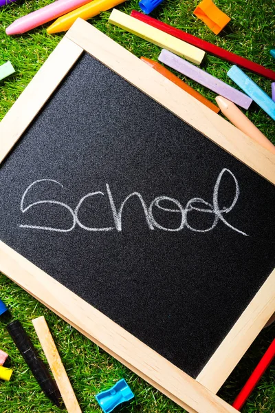 Back to school, blackboard layout and accessories vivid colorful. Copy space — Stock Photo, Image