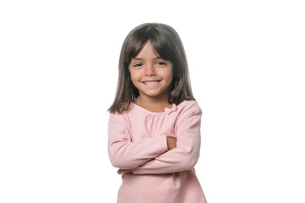 Retrato de una niña morena posando aislada sobre fondo blanco . —  Fotos de Stock