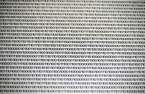 binary code numbers on white paper background