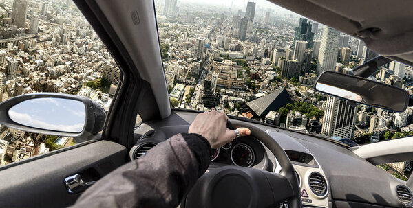 манипуляции с фотографией за рулем летающего автомобиля в обход движения
 