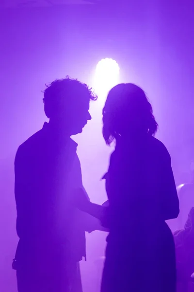 man and woman dancing in nightclub