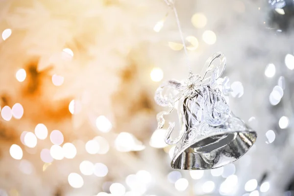 Silver Christmas Bell Decoration Blurred Sparkling Holiday Background — Stock Photo, Image