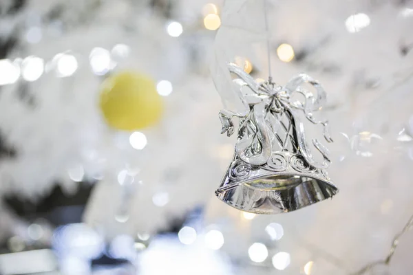 Silver Christmas Bell Decoration Blurred Sparkling Holiday Background — Stock Photo, Image
