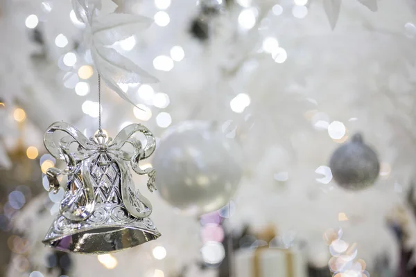 Silver Bell Christmas Decorations Blurred Sparkling Holiday Background — Stock Photo, Image