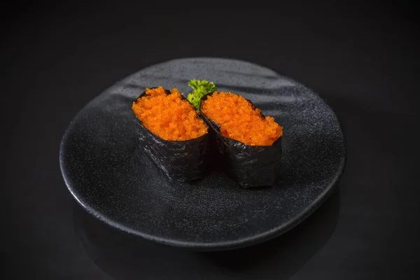 Ebiko Nigiri, Shrimp, Sushi bar menu, Sushi Ebiko served on traditional ceramic dish, Japanese food style, Japanese menu, Shrimp sushi on black background, selective focus