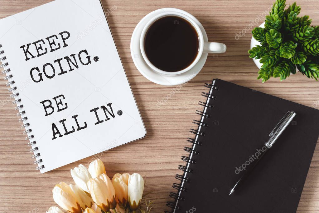 Inspirational and motivation life quote on notepad - Keep going,