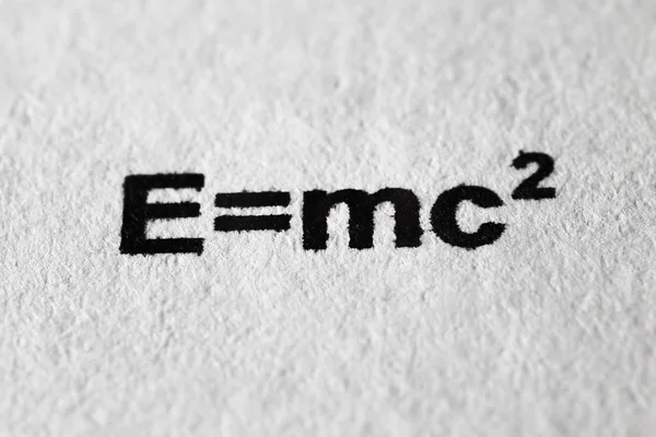 The formula of relativity theory printed on paper. Macro mode.