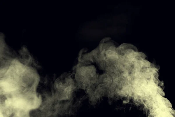 White vapor on the black background.