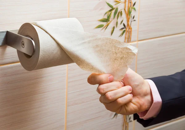 Mâna Unui Afaceri Care Caută Hârtie Igienică — Fotografie, imagine de stoc