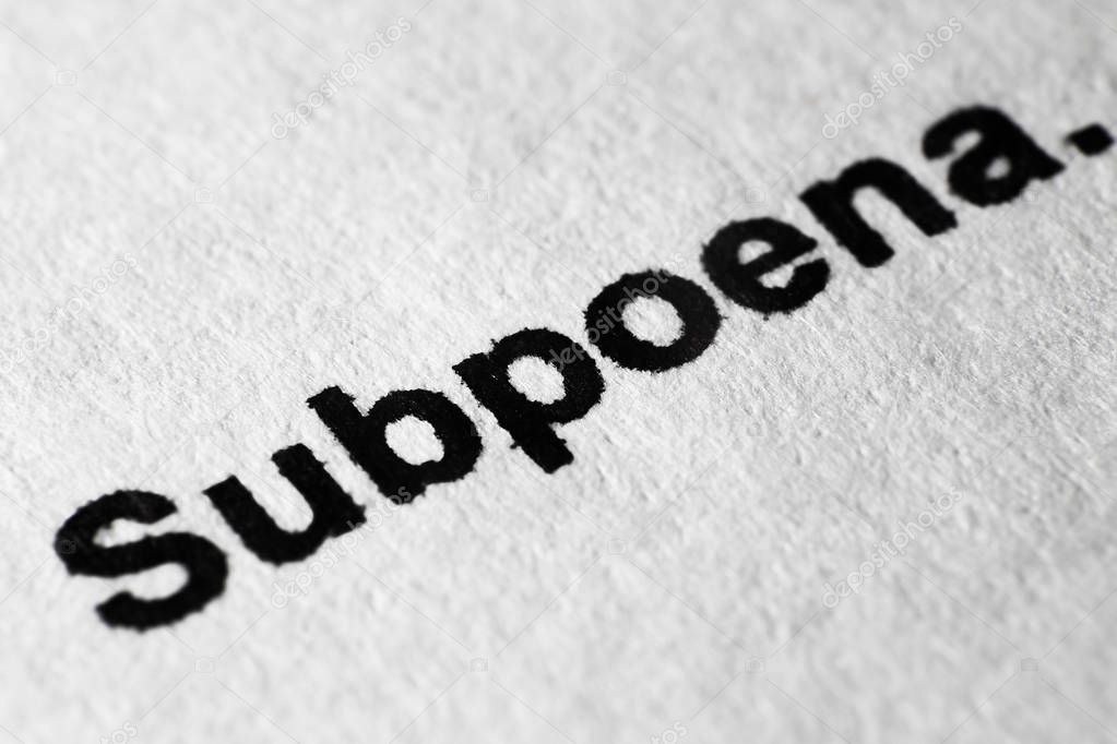The word Subpoena printed on paper. Macro mode.