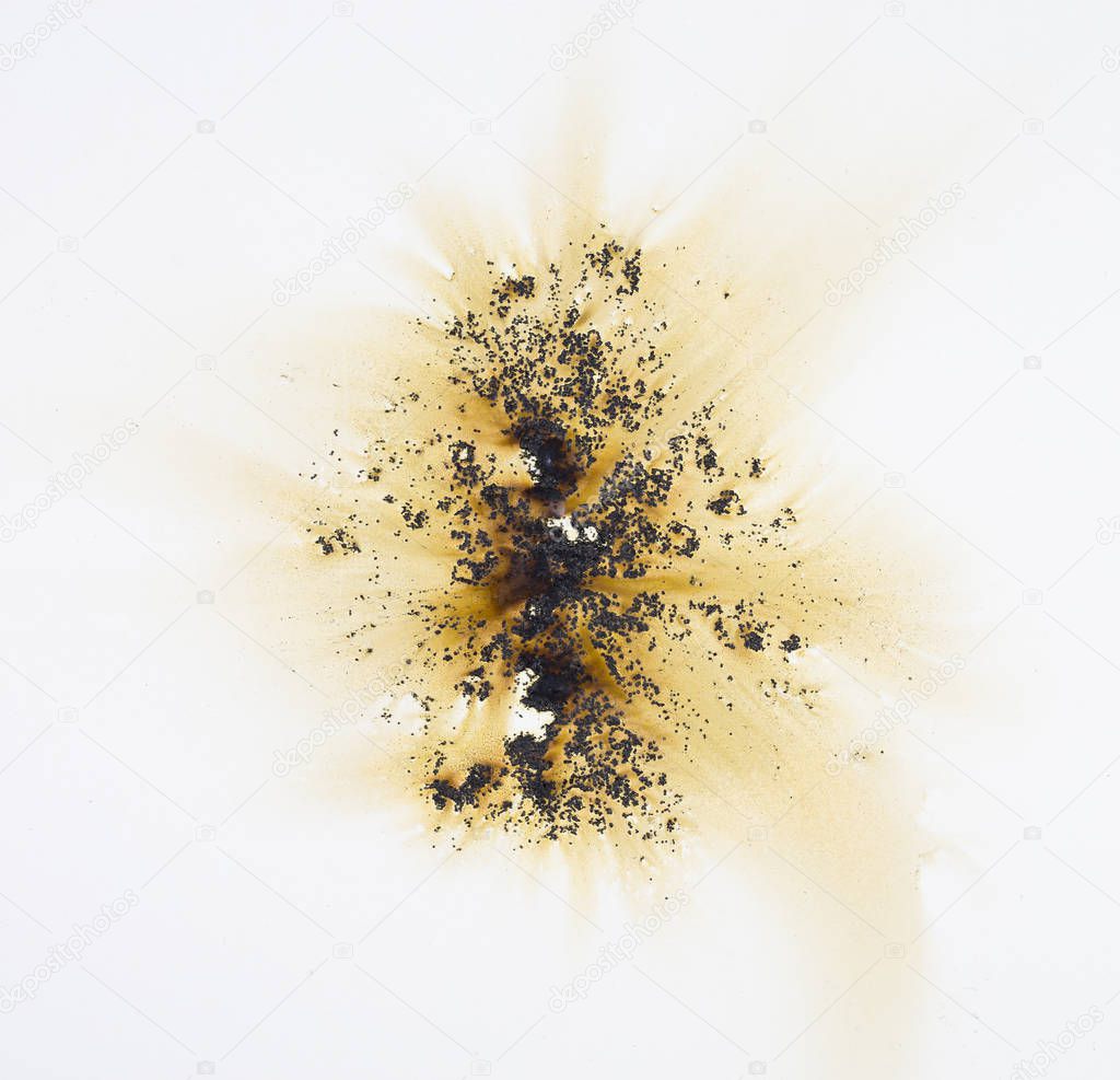 Grunge background, the trace of the explosion gunpowder on a white