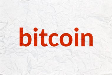 Buruşuk beyaz kağıt üzerinde yazıt bitcoin